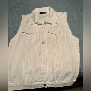 White sleeveless denim jacket